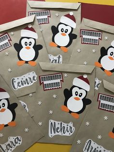 several envelopes decorated with penguins and snowflakes