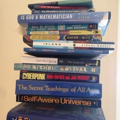 a stack of books sitting on top of each other