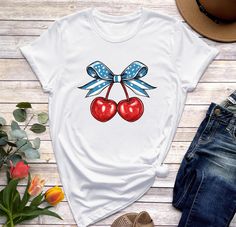 cherry shirt, fruit shirt, cherries shirt, cherry tee, gift for her, coquette shirt, cherry tshirt, summer shirt, coquette top, coquette clothing, cherry gift, coquette aesthetic, coquette clothes, soft girl aesthetic, cherry graphic tee, coquette tshirt, vegan shirt, y2k shirt, cherry top, cherry sweatshirt, cottagecore shirt, retro cherry shirt, cherry coquette, downtown girl, cherry t shirt, cherry clothing, y2k clothes, aesthetic clothes, fruit tshirt, foodie shirt, fruit lover, fruit t shirt, summer fruit shirt, comfort colors, dollette clothing, cherry, farmers market shirt, cherry gifts, cherries t shirt, cherry baby tee, bow baby tee, cherry lover, comfort colors shirt, gardening gift, cherry lover gift, kawaii clothes, independence day, graphic shirt, preppy clothes teens, cute sh Sweet Red Summer Tops, White T-shirt For Summer Gift, Trendy Summer Tops With Cherry Print, Red T-shirt For Summer Gift, Trendy Cherry Print Tops For Summer, Retro Strawberry Print Summer Tops, Retro Strawberry Print Tops For Summer, Cute Cherry Print T-shirt For Summer, Trendy Cherry Summer Top