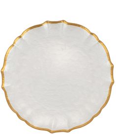 a white and gold plate on a white background