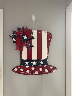 a patriotic hat hanging on the wall