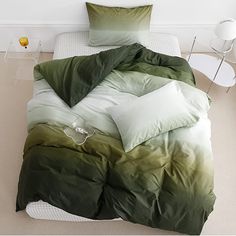 PRICES MAY VARY. 【HIGH QUALITY＆DURABLE CONSTRUCTION】 This green white gradient comforter is filled with whole-piece superior microfiber, so this comforter is soft and durable. High quality fabric through unique printing and weaving technology makes this product resistant to fading, breathable and lightweight. 【3 Pcs Queen Comforter Sets】 1 x queen comforter (90" x 90'') and 2 x standard pillowcases (20" x 26"). 【ADD WARM TO YOUR HOME】 Available for all seasons.Dark green and white quilt is soft White And Green Bedding, Minimalist Bedding Sets, Green Comforter Sets, Green Bedding Set, Queen Size Comforter Sets, Abstract Art Watercolor, Green Comforter, Colorful Comforter, Queen Size Comforter