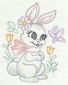 an embroidered bunny with flowers on it's chest