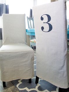 two chairs with the number three on them