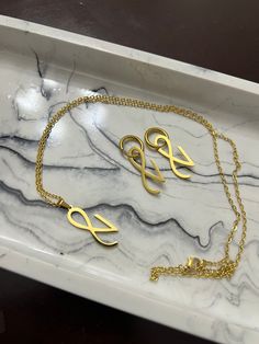 Jungkook golden necklace.  Perfect for a gift .  Great for concert or every day use.  There may be slight variations from the photos, depending on the light of your screen. Material:  Stainless Steel  Size:   24 inches chain. Color: gold Stainless Steel Earrings size: thickness 1.5mm Earrings height: 30.00 mm Earrings wide: 1.5 mm All products are made to order Come with Freebies Jungkook Accessories, Gifts For Bts Army, Jungkook Necklace, Jungkook Earrings, Bts Necklace, Army Accessories, Neon Accessories, Jungkook Golden, Pop Jewelry