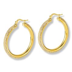 Nomination Italy Goldtone Mesh and Crystal Large Hoop Earrings  Add a bold pop of diamond-like sparkle to your profile with these crystal-studded, goldtone earrings from Nomination Italy. The 1-3/16" hoops are the perfect size for dressing up your favorite, special-occasion ensembles.       Approx. 1-9/16"L x 3/16"W; 1-3/16" diameter     Stamped .925; goldtone finish     Pierced with joint-and-catch closures     Goldtone sterling silver hoop earrings have mesh covering on outer circumference stu Large Hoop Earrings, Sterling Silver Hoop Earrings, Sterling Silver Hoops, Silver Hoops, Silver Hoop Earrings, Crystal Glass, Dressing Up, Clear Glass, Silver Gold