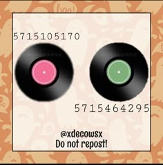 two black records with pink and green eyes are on the same card as each other