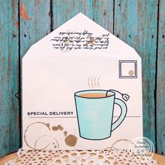 a card with a cup of coffee on it and the words special delivery written in black ink