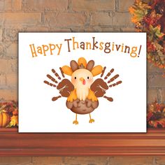 a happy thanksgiving card with an image of a turkey on the front, and a brick wall in the background