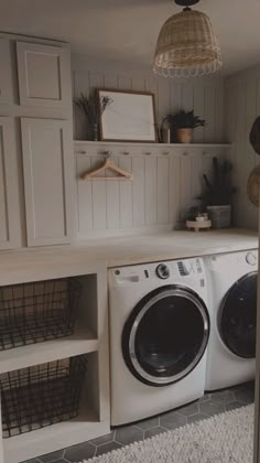 a washer and dryer in a small room