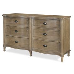 a large wooden dresser with drawers and knobs