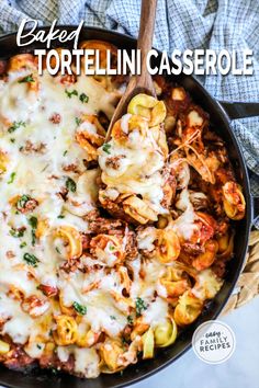 a skillet filled with baked tortellini casserole