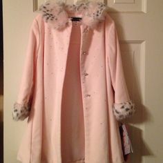 Biscotti Pink Coat. Includes Rhinestone Accents, Buttons And Faux Fur Trim At Collar And Wrists. A Faux Fur Trimmed Hat Is Also Included. Never Worn. This Is A Beautiful Coat!! Pink Faux Fur Trim Coat For Spring, Fur Trim Coat Y2k, Fur Trimmed Coat, Pink Coat Fur Trim, Vintage Fur Coat With Faux Fur Trim, Faux Fur Trim Coat, Faux Coat, Long-sleeved Faux Fur Coat With Fur Trim, Fur Trim Coat