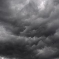 black and white photograph of clouds in the sky