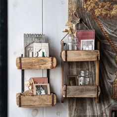 two wooden shelves with pictures and books on them