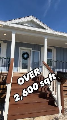 there is a sign that says over 2, 600 sqft on the front porch