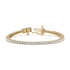 This classic tennis bracelet features a single row of sparkling brilliant cut diamonds Set in gold four-prong baskets with a total diamond weight of 2Cts Gorgeous Engagement Ring, Diamond Tennis Bracelet, Tennis Bracelet Diamond, Tennis Bracelet, Lab Diamonds, Diamond Earrings Studs, High Quality Jewelry, Brilliant Cut Diamond, Diamond Studs