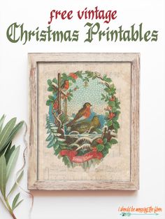 a christmas printable is hanging on the wall next to a plant and potted plant