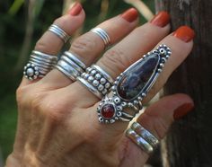 "EUDIALYTE STATEMENT RING WITH CARNELIAN -- handcrafted in oxidized STERLING SILVER -- ornamental oxidized silver work ARTISAN MADE --- Power Ring US SIZE 8.25 (8 1/4)  AN ULTRA-UNIQUE AND EXQUISITE pairing of EUDIALYTE AND CARNELIAN in this one of a kind designer statement ring, set in oxidized Sterling Silver, created for the bohemian jewelry lover and wearable art collector.  Signed and Dated 2023.   Perhaps a true power ring with healing properties from both of these powerful gemstones. A BI Artisan Hand Forged Red Jewelry, Handmade Bohemian Carnelian Ring, Bohemian Handmade Carnelian Rings, Unique Handmade Garnet Ring, Artisan Moonstone Ring, Ring Of Power, Eye Ring Silver, Balancing Emotions, Big Stone Ring