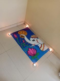 an elephant rug with lights on the floor