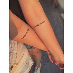 two people with matching tattoos on their legs that say, i love you more than me