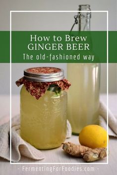 two jars filled with ginger beer next to lemons