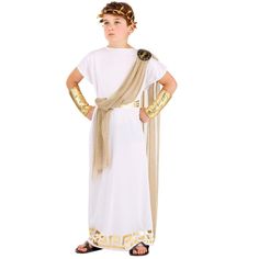 a young boy dressed in an ancient greek costume with gold arm sleeves and headpieces