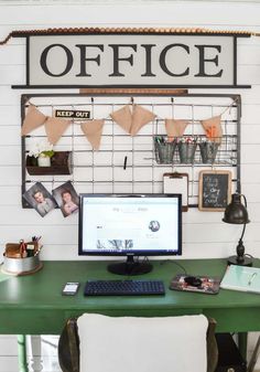 a desk with a computer on it in front of a sign that reads office keep out