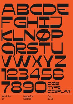 an orange poster with black letters and numbers on the bottom half of it, which are also in different font styles