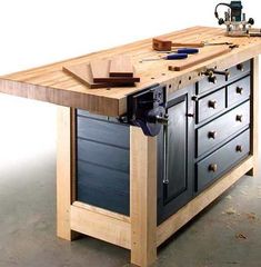 a workbench with tools on top of it