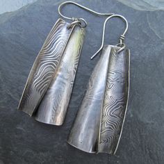 Long Earrings Rustic Sterling Silver Curl Swirl Artistic Shoulder Dusters Artistic Hand Forged Sterling Silver Earrings, Artistic Design Drop Earrings, Unique Artistic Drop Earrings, Fusion Style Hand Forged Drop Earrings, Unique Silver Earrings With Artistic Design, Artsy Hand Forged Earrings As Gift, Artsy Hand Forged Earrings For Gift, Hand Forged Artsy Earrings For Gifts, Unique Spiral Earrings