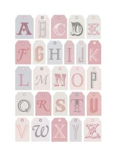 the alphabet is made up of pink and gray letters