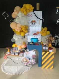 a birthday party with balloons and decorations