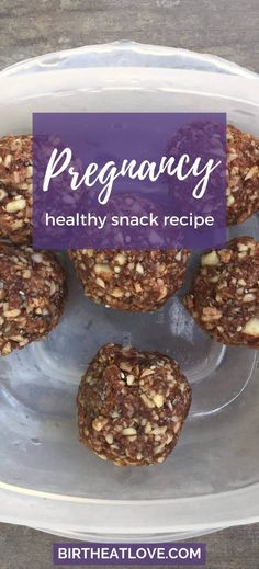 healthy snack recipe made with granola and nuts in a plastic container on top of a table