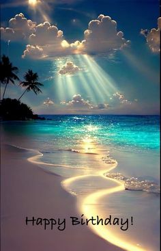 a beach scene with the sun shining through clouds