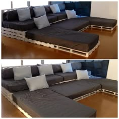 the couch is made out of pallets and has pillows on it