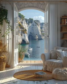 a living room with an open door leading to the ocean and boats in the water