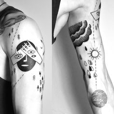 two men with tattoos on their arms, one has an eye and the other has a sun