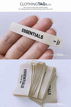 a hand holding a tag that says essentials and the words essentials are printed on it