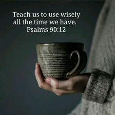 a woman holding a cup with the words teach us to use wisely all the time we have