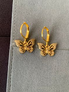 Gold Butterfly Earrings - Silver 925, gold plated, Hypoallergenic (1pair) These 0.5 Inches in length, light weight, 18K Gold Plated brass Butterflies, Cubic Zircon on the trim of the wings. Comfortable and safe to ears. The butterfly has been a symbol of transformation, hope and faith for thousands of years. The butterfly is also a symbol of rebirth, since it goes through so many life cycles -- from larva to caterpillar to chrysalis and finally to a beautiful, flying butterfly. Gold Hypoallergenic Hoop Earrings For Formal Occasions, Gold Plated Huggie Earrings Gift, Formal Gold Hypoallergenic Hoop Earrings, Hypoallergenic Gold Hoop Earrings For Formal Events, Gold Earrings For Anniversary With Ear Wire, Yellow Gold Hypoallergenic Earrings For Gift, Gold-tone Pierced Huggie Earrings Gift, Hypoallergenic Butterfly-shaped Yellow Gold Jewelry, Hypoallergenic Yellow Gold Butterfly Jewelry