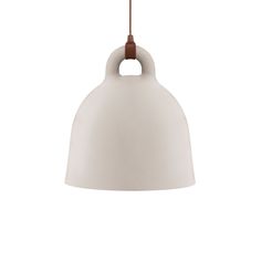 a white pendant light hanging from a brown cord on a white wall with a wooden handle