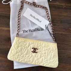 There Is Absolutely Nothing Wrong With This Bag! I Ordered It From The Real Real And I Missed In The Description That It Was More Yellow Than White. It Was 100% My Mistake And I Am Unable To Return. It Is Authentic And Still Has The Tag On. Chanel Makeup Bag, Chanel Pouch, Chanel Coco Handle, Chanel Mini Flap Bag, The Real Real, My Mistake, Vintage Chanel Bag, Chanel Clutch, Coco Handle