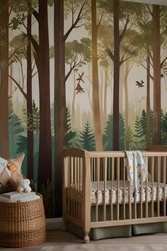 a baby crib in front of a forest mural