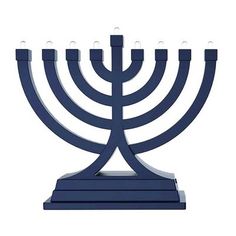 a hanukkah menorah with candles lite up on a white background