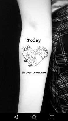 a person with a tattoo on their arm and the words today written in black ink