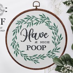 a cross stitch pattern with the words have a nice poop on it and some flowers