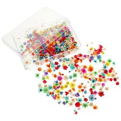 colorful beads in a plastic container on a white background