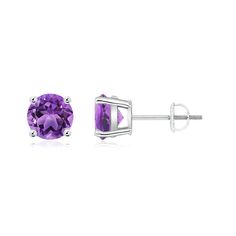 Simple and elegant, these amethyst solitaire stud earrings are set in platinum. The round amethysts exhibit their mysterious purple allure with a sparkle. They are held in a basket-style prong setting for added brilliance. Purple Amethyst Earrings, 6th Wedding Anniversary, Silver Basket, Amethyst Studs, Solitaire Studs, Amethyst Jewelry, Round Stud Earrings, Stud Earrings For Women, Basket Sets