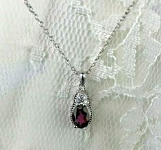 Avon Sterling Silver Classic Gem Pendant - Ruby Color  -  New in Box!  18" chain.  Very dainty and beautiful!   Questions welcome!  FREE FIRST CLASS SHIPPING! Outfits Juvenil, Vintage Pendant Necklace, Avon Jewelry, Ruby Necklace, Fashion Jewelry Necklaces, Fashion Watches, Ruby, Jewelry Watches, Jewelry Necklace Pendant